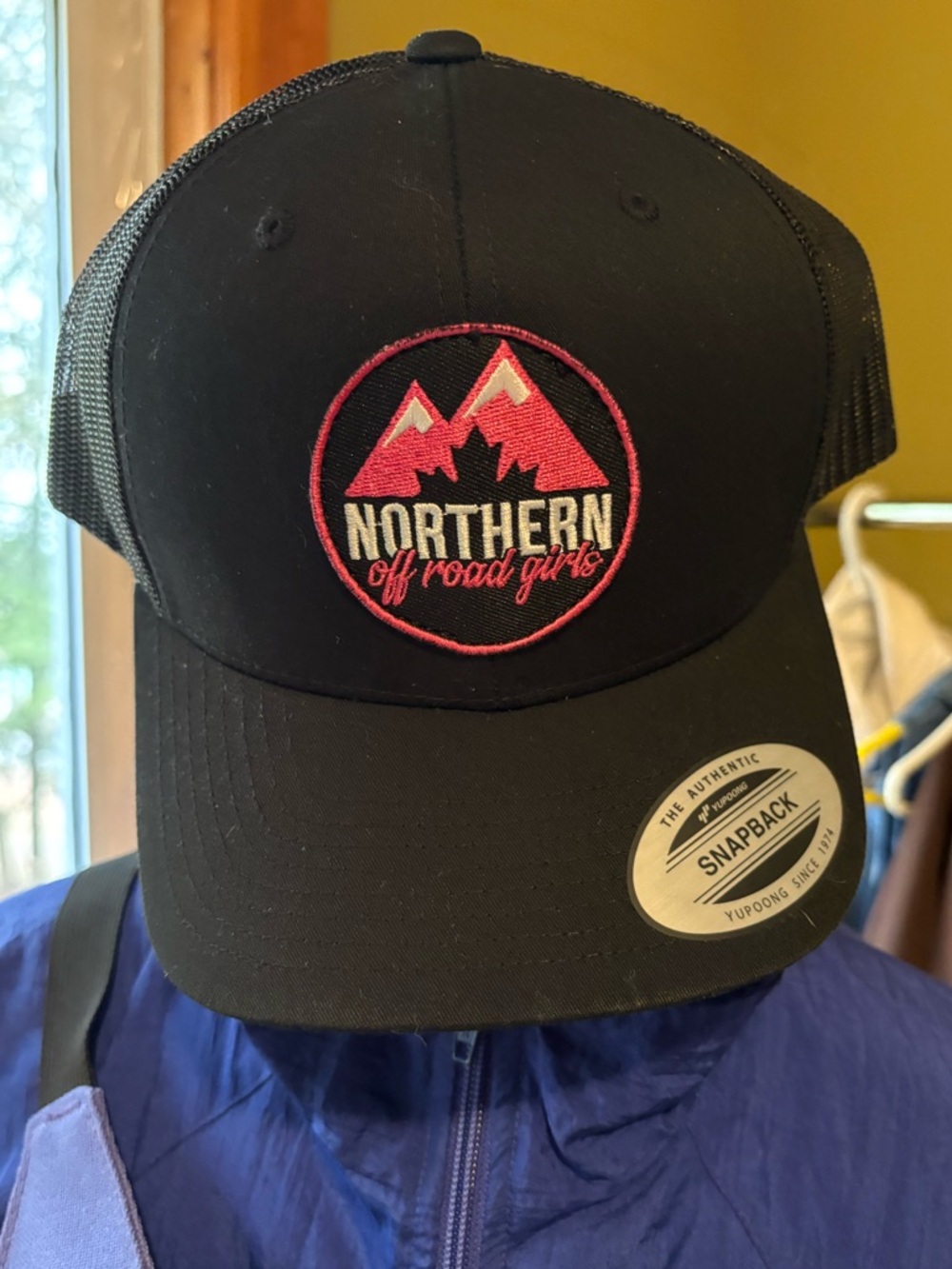 Black Snapback Hat with Pink Mountain Patch -